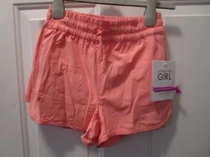 ATHLETA GIRL DIVE IN BOARDSHORTS IN CORAL SIZE MEDIUM/ 10 NEW - Picture 1 of 2