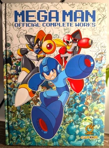 Libro de arte de tapa dura oficial Mega Man obras completas Udon Capcom juegos clásicos - Imagen 1 de 5