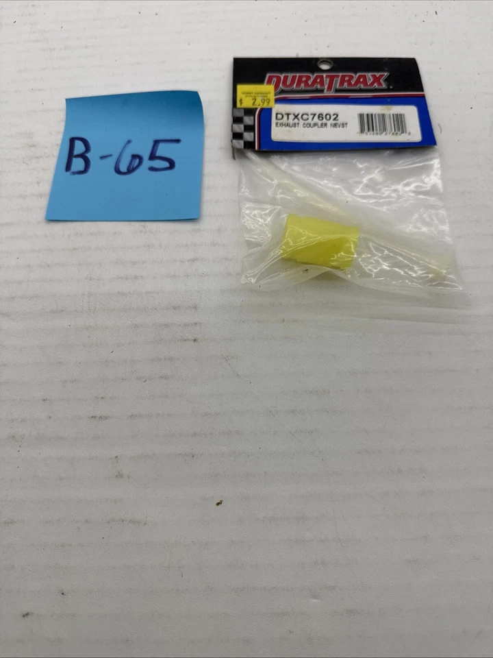 RC Duratrax Spare Part Nitro Engine NEVST Exhaust Coupler Yellow (1) DTXC7602 - Image 1 of 1