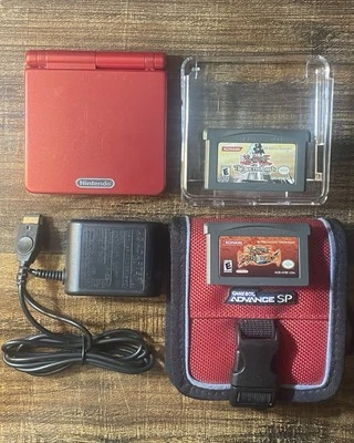 Game Boy Advance SP Flame Red AGS-001 BUNDLE Charger, 2 Kinds of Cases, 2 Games - Image 1 of 4