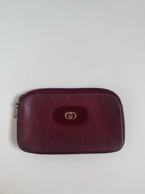 Monedero Gucci vintage de cuero borgoña con cremallera y logotipo Foto 1 de 4