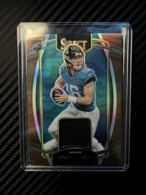 2021 Panini Select - Rookie Swatches Trevor Lawrence #RSW-TLR/49 Jaguars RC - Image 1 of 2