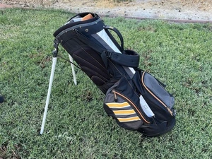 Adidas Clutch 6 Wege Golf Standbag Dual Strap mit Regenschutz orange schwarz - Bild 1 von 18
