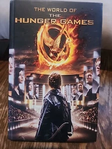 El mundo de los juegos del hambre de Kate Egan, Suzanne Collins e Inc. Como nuevo - Imagen 1 de 3