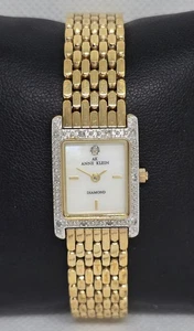Reloj de cuarzo para mujer Anne Klein diamante tono dorado esfera mop correa 09 - Imagen 1 de 9