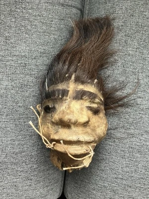 Cabeza encogida Foto 1 de 4