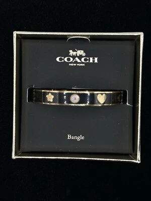 ¡Brazalete COACH Signature esmalte negro y dorado!! Foto 1 de 4