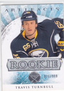 12/13 ARTIFACTS..TRAVIS TURNBULL..ROOKIE../999..CARD # 157..SABRES.COMBINED SHIP
