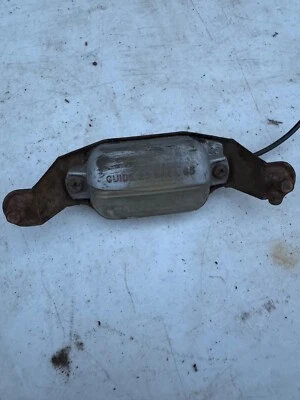Luz de etiqueta de matrícula trasera OEM GM 1965-1968 Pontiac GTO LeMans 5956698 Foto 1 de 4