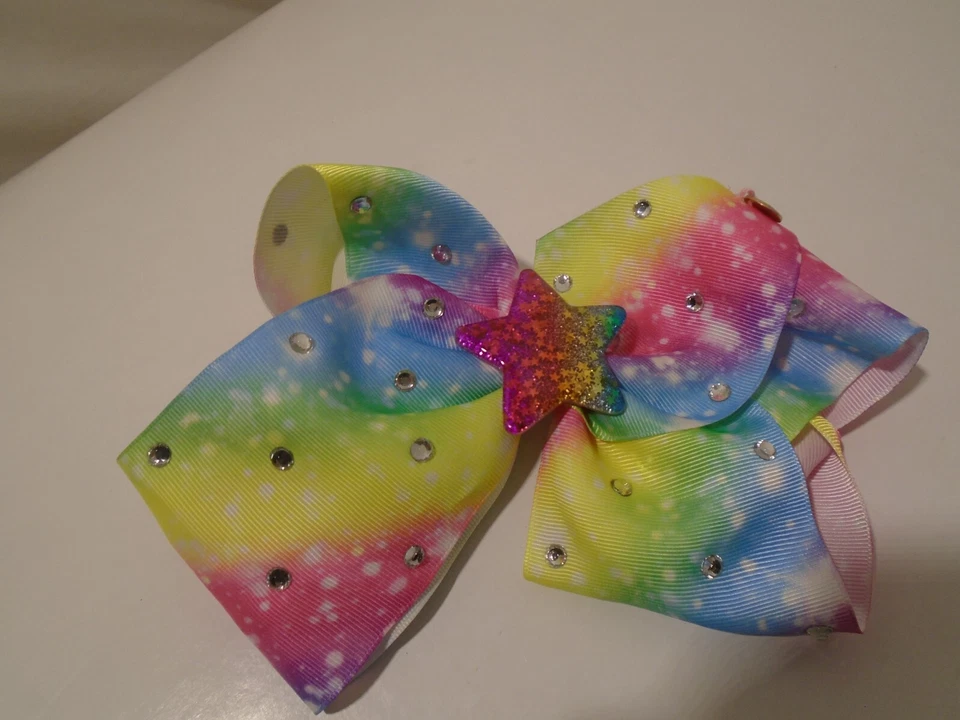 JoJo Siwa Rainbow Tie Dye estrella brillo multicolor moño de pelo grande tiene logotipo Foto 1 de 2
