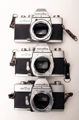 Lote a granel 3 cámaras Minolta 35 mm, 2x SRT 101, 1x SRT 200, todas avanzadas, fuego, medidor Foto 1 de 4