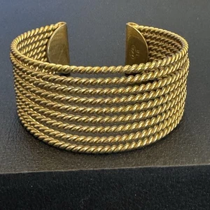 Pulsera brazalete cuerda trenzada vintage Avon, brazalete tono oro 9 hilos - Imagen 1 de 7
