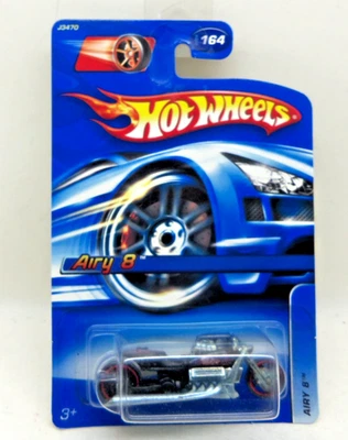 Hot Wheels Airy 8 Motorcycle 2006 Vintage - New on Long Card  # 164 - Image 1 of 3