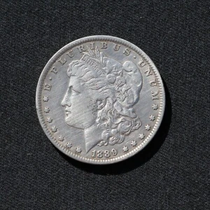1889 $1 Morgan Silver Dollar - Picture 1 of 3