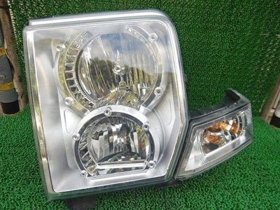 CHRYSLER Jeep commander 2006 Left Headlight 55157207AE [Used] [PA65994780] - image 1 of 4