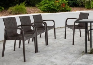 Set of Four 24" Brown Faux Rattan Heavy Duty Plastic Outdoor Stacking Arm Chairs - Picture 1 of 10