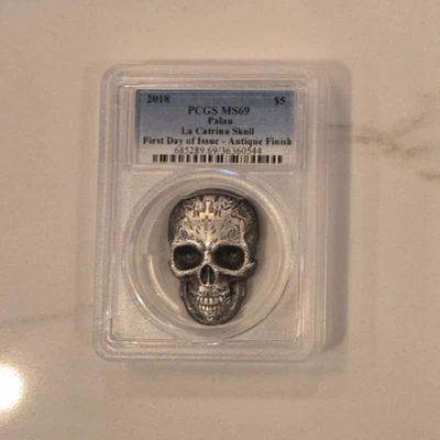 2018Palau, $5 Dia Muertos La Catrina Skull .999 Silver Coin. Perfect! PCGS MS69 - Image 1 of 3