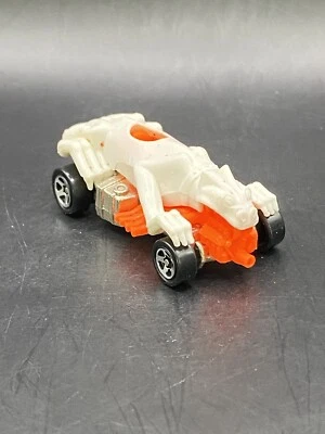 Coche de carreras diecast Mattel Hot Wheels 1985 blanco sobre naranja Panther Foto 1 de 4