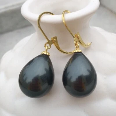 Enormes pendientes de perlas de Tahití con caparazón negro natural de 13x18 mm de oro de 14 k p Foto 1 de 4