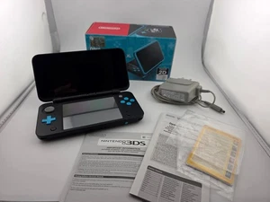 New Nintendo 2DS XL in OVP schwarz türkis - Picture 1 of 18