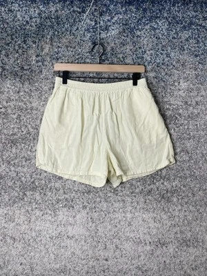 Pantalones cortos Zara de algodón amarillo para mujer talla pequeña Foto 1 de 4