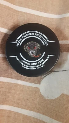 2024-25 Monroe Mocasines (FPHL) Temporada Inaugural Juego Oficial Disco Foto 1 de 2