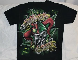 JOKER CALAVERA MARIHUANA HOJA DE HUMO TOKIN Y CAMISETA JOKIN - Imagen 1 de 4