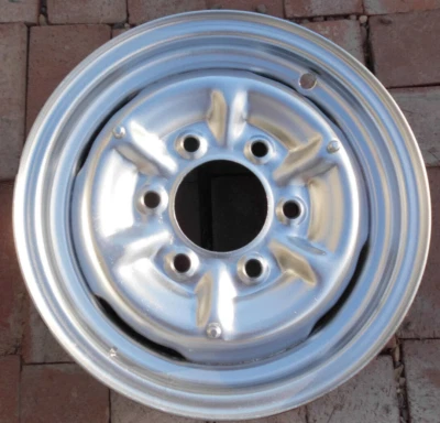 VINTAGE DATSUN PICKUP 14" x 4" WELDED BACK STEEL WHEEL. 6 LUG X 5.5". - Image 1 of 4