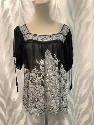 Blusa para mujer ECI negra/blanca 100 % seda manga corta borla corbatas talla 10 Foto 1 de 4