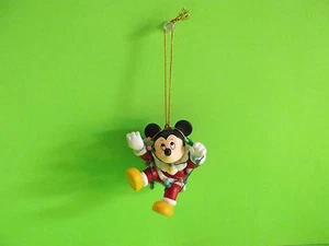 Disney's Mickey Mouse Dressed Up as Santa Tangled in Christmas Lights - Picture 1 of 9
