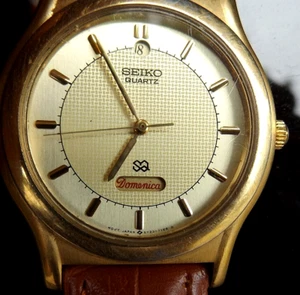 SEIKO GOLD UNUSUAL ALTERNATE DAY DATE DIAL NEW BATTERY & STRAP JAPAN COLLECTION - Picture 1 of 19