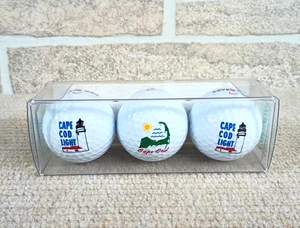 NUEVO DE COLECCIÓN PELOTAS DE GOLF Y2K Cape Cod Marthas Vineyard grado profesional paquete de 3 disfrutar de la vida 2003 - Imagen 1 de 4