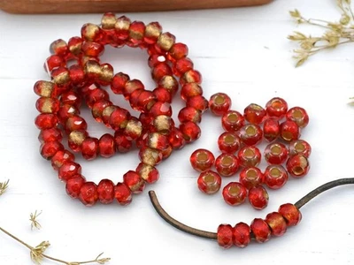 Cuentas de vidrio checo rondelle agujero grande rojo rubí forrado en oro de 5x8 mm 25 cuentas Foto 1 de 4