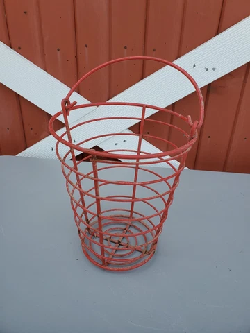 VINTAGE RED METAL EGG BASKET WITH FOLD DOWN HANDLE APPROX. 9" TALL Cover