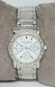 Damen Akribos XXIV AK530SS Kristall Lünette Multifunktion Silberfarben Uhr C9 - Bild 1 von 9