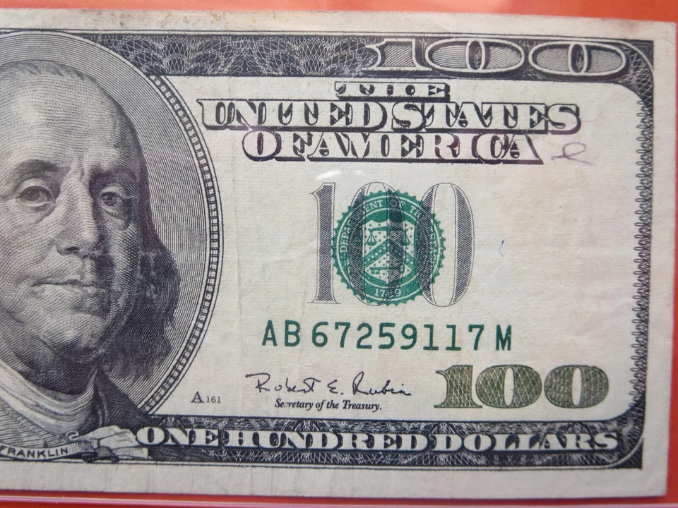 $100 1996 federal reserve note graded error:  edge damage stained  26-023 - Image 1 of 3