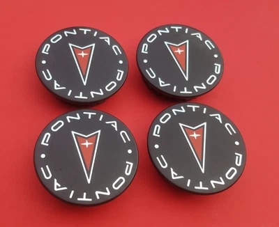 JUEGO CENTRAL TAPACUBOS RUEDA PONTIAC AZTEK GRAND PRIX AM VIBE MONTANA SUNFIRE OEM C31 Foto 1 de 4