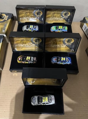 2004 NASCAR 1:64 ELITE 5 car lot Jeff Gordon Dupont Pepsi Wizard Oz HMS 20th - Image 1 of 4