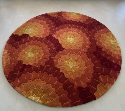 Momeni Hand Tufted round area rug 7 ft plus, Orange, Red And Yellow - Image 1 of 4