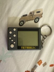 Squaresoft Tetris Jr. Pocket Keychain Handheld Electronic LCD Game NOT WORKING - Picture 1 of 2