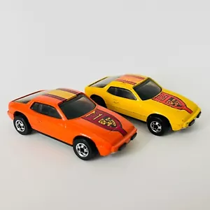 Hot Wheels Lot of 2 Upfront 924s w/Blackwalls Yellow 1979 and Orange 1980 - Picture 1 of 13
