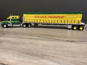 DCP 30338 1:64 Scale Wallace Transport IH 9400 Semi w/ Flatbed Trailer - Picture 1 of 6