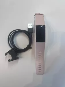 FITBIT CHARGE 3 - FAULTY POWERS ON, NO SCREEN DISPLAY AND AFTER MARKET CHARGER - Picture 1 of 8