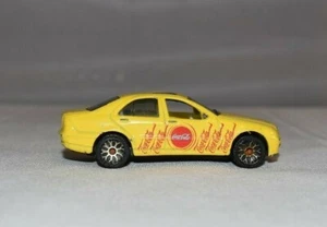 1999 Matchbox Coca Cola Yellow Mercedes Benz S500 Die-cast Car 1:65 Scale - Picture 1 of 6