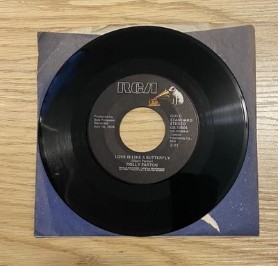 1974-DOLLY PARTON, " LOVE IS LIKE A BUTTERFLY /SACRED MEMORIES", 7" RCA, COUNTRY - Image 1 of 3