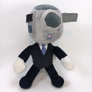 Muñeca de peluche Skibidi Toilet Man Camarógrafo juguete 10 pulgadas - nueva - Imagen 1 de 4