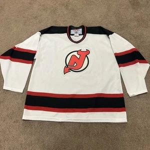 Vintage 90s CCM New Jersey Devils NHL Hockey Trikot weiß Größe XL - Bild 1 von 10