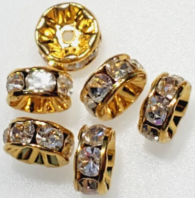Cuentas espaciadoras de diamantes de imitación de cristal checo Rondelle chapadas en oro de 7 mm 100 piezas Foto 1 de 4
