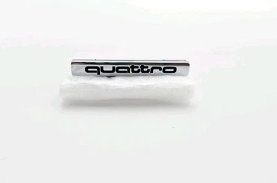 AUDI A3 A4 A6 A8 QUATTRO 2004-2010 EMBLEMA TRASERO LOGOTIPO INSIGNIA SÍMBOLO CROMO OEM Foto 1 de 4