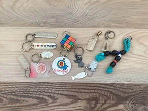 Lot 12 Mixed Keychain: Russ~USC Rubic’s Cube~Olympics~Angel & More - Picture 1 of 6